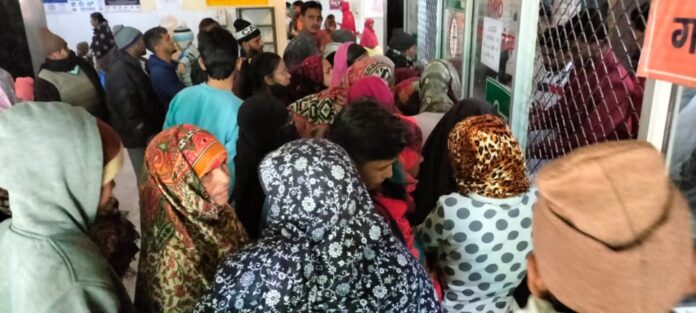 Crowd of patients at community health centre