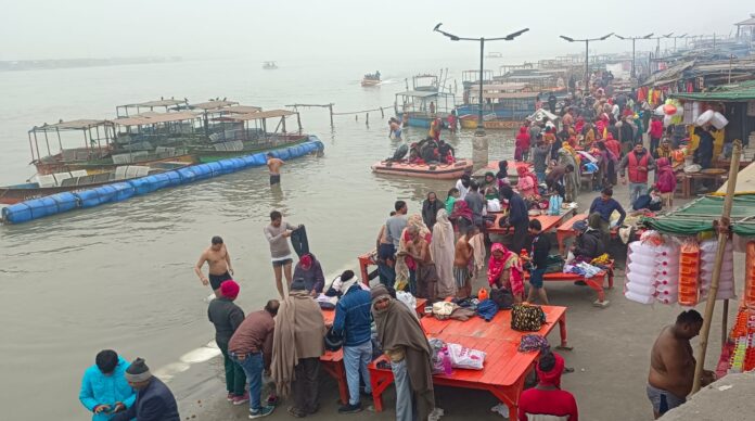 Devotees bathing in the Ganges on Paush Purnima