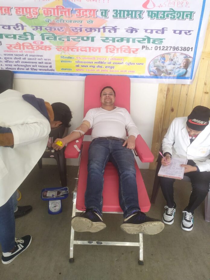 young man donating blood