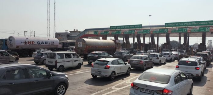 Queue of vehicles at toll plaza