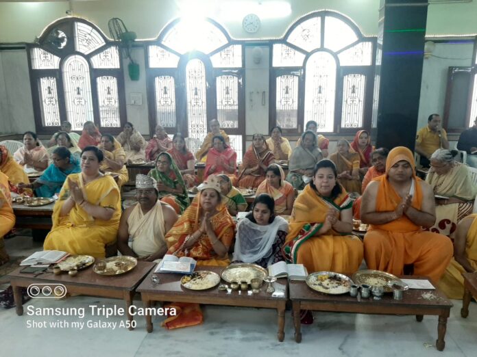 Shantinath participating in the Vidhan Path at the Digambar Jain Temple