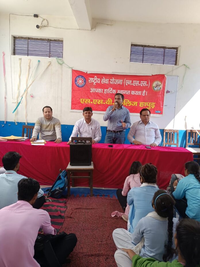 Speaker expressing views in seven day special camp of National Service Scheme