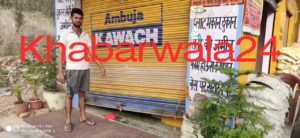 shopkeeper showing broken shutter