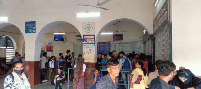 Crowd of passengers at railway station 1