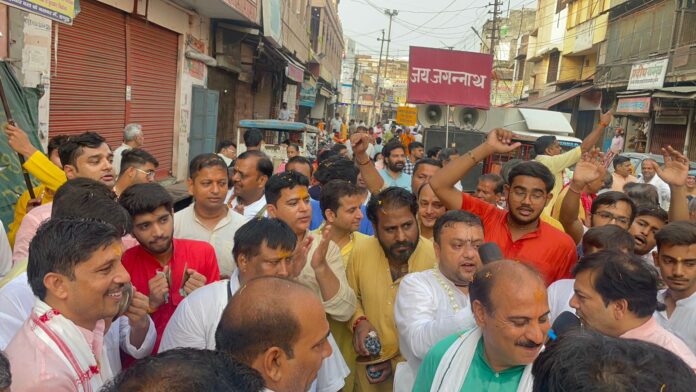 Devotees taking part in the palanquin procession of Lord Jagannath