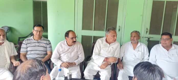 Trilok Tyagi participating in the mango feast organized in village Dhanaura