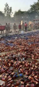 Hapur Crime News पुलिस ने शराब माफियाओं की 34 लाख की शराब पर चलाया बुलडोजर